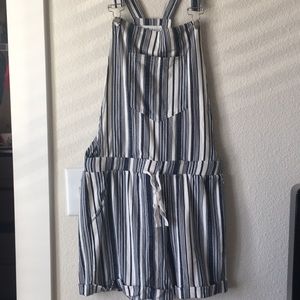 Short overalls. Never been worn.